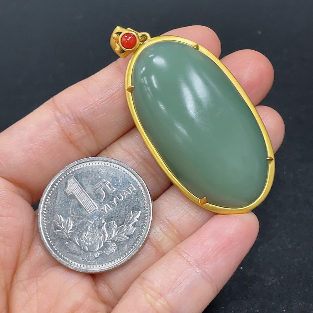 Hetian jade cabochon pendant in 18K gold necklace, featuring polished jade beads, crafted by HKHQ.