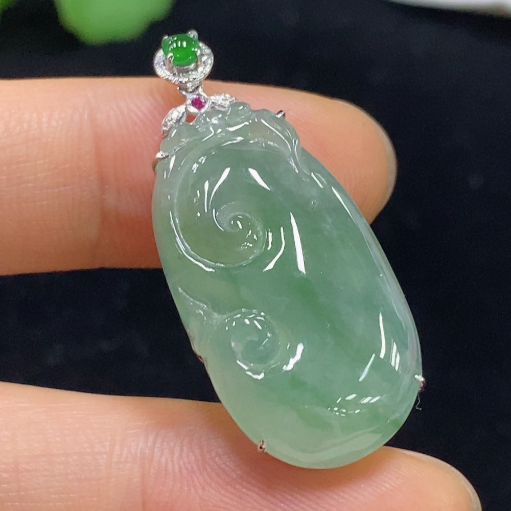 Huiliu Jadeite pendant Ruyi with inlaid colorless diamonds, showcasing intricate craftsmanship and luxurious design.