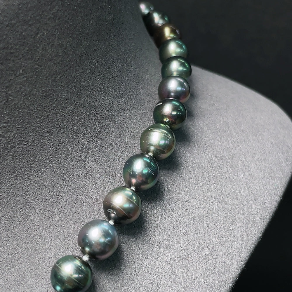 HKHQ seawater pearl necklace with 8.1-10.8mm pearls, non-gold, weighs 52.81g, featuring a natural color variation.