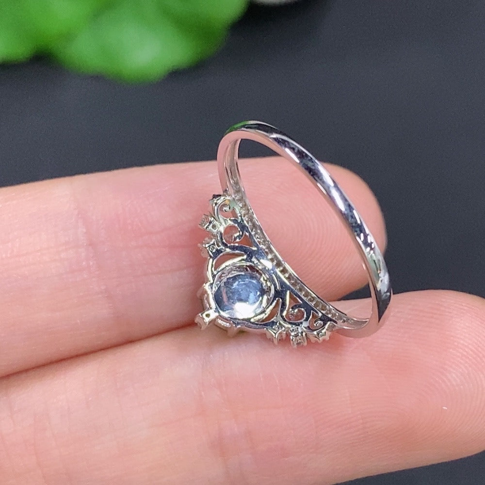 Jadeite cabochon ring with diamond accents in 18k gold, size 15, featuring a polished green jade stone and delicate gold setting.