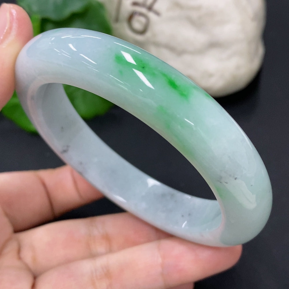 Jadeite round bangle in size 58.4 with a total weight of 73.8g, featuring smooth, polished jade surface and subtle green hue.