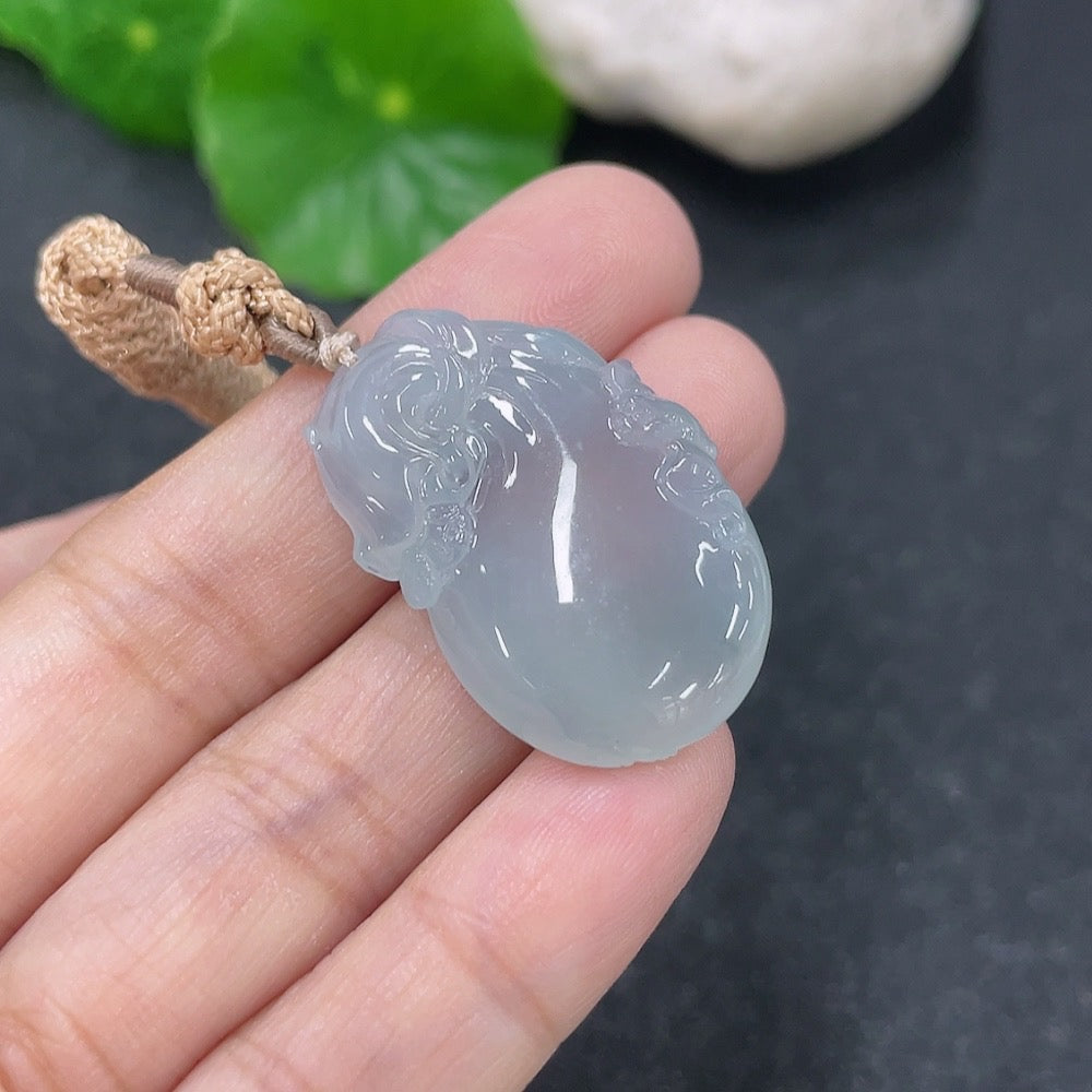Jadeite pendant shaped like a money bag with a rope, weighing approximately 9g, crafted by HKHQ, showcasing smooth green jade texture.