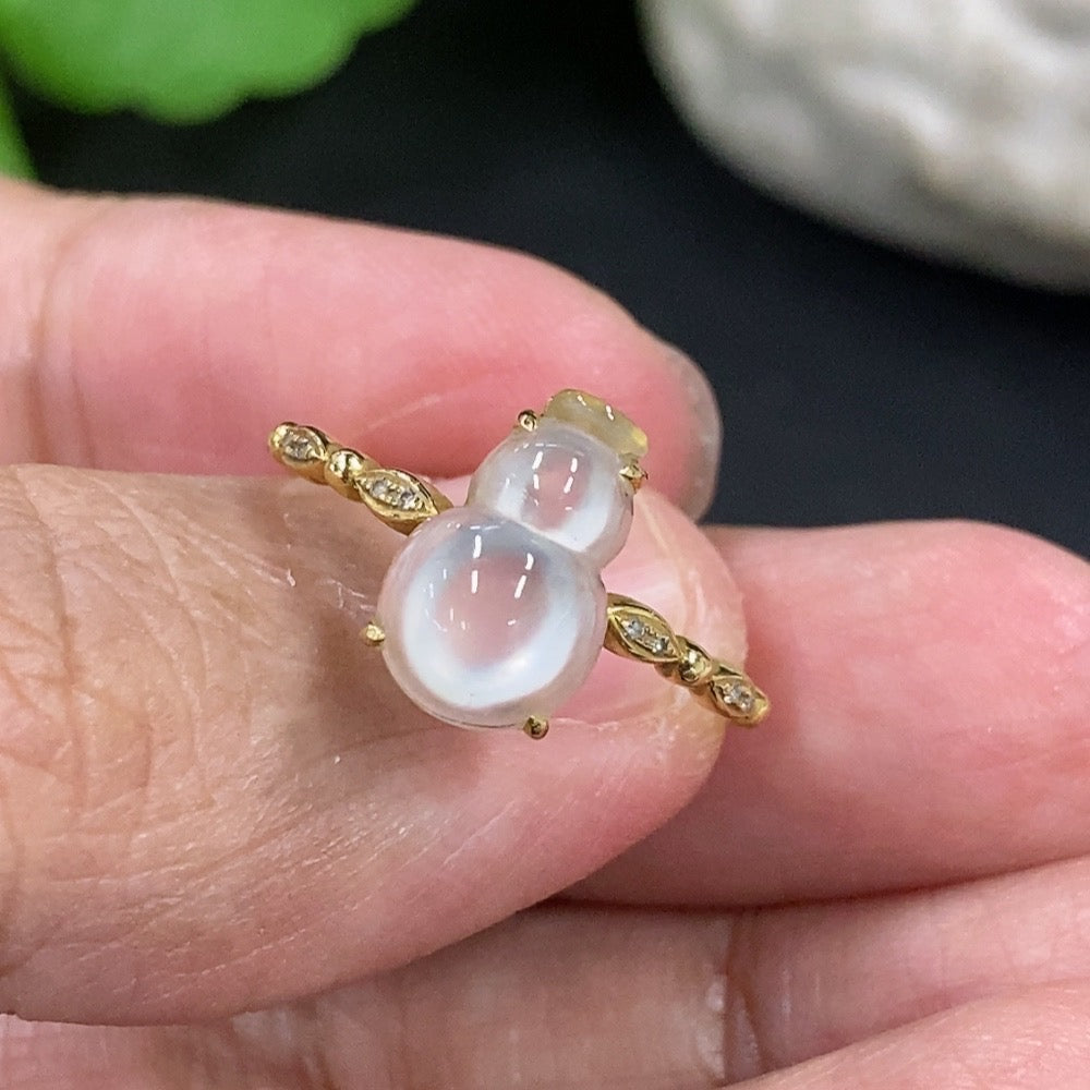 Jadeite gourd ring with 18K gold band, non-diamond, featuring smooth green jadeite stone and elegant gold setting.