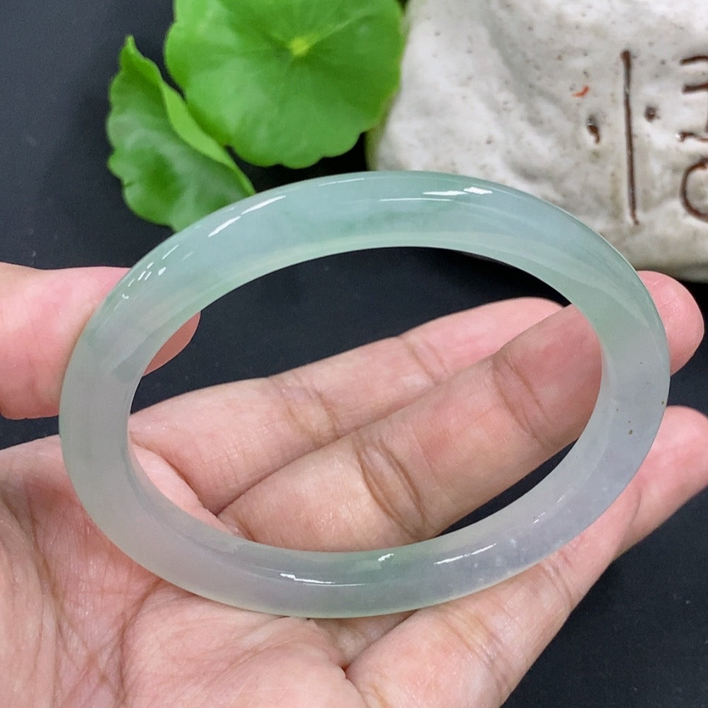 HKHQ jadeite oval bangle, size 55.3, 24.3g, smooth green jade bracelet with polished finish.