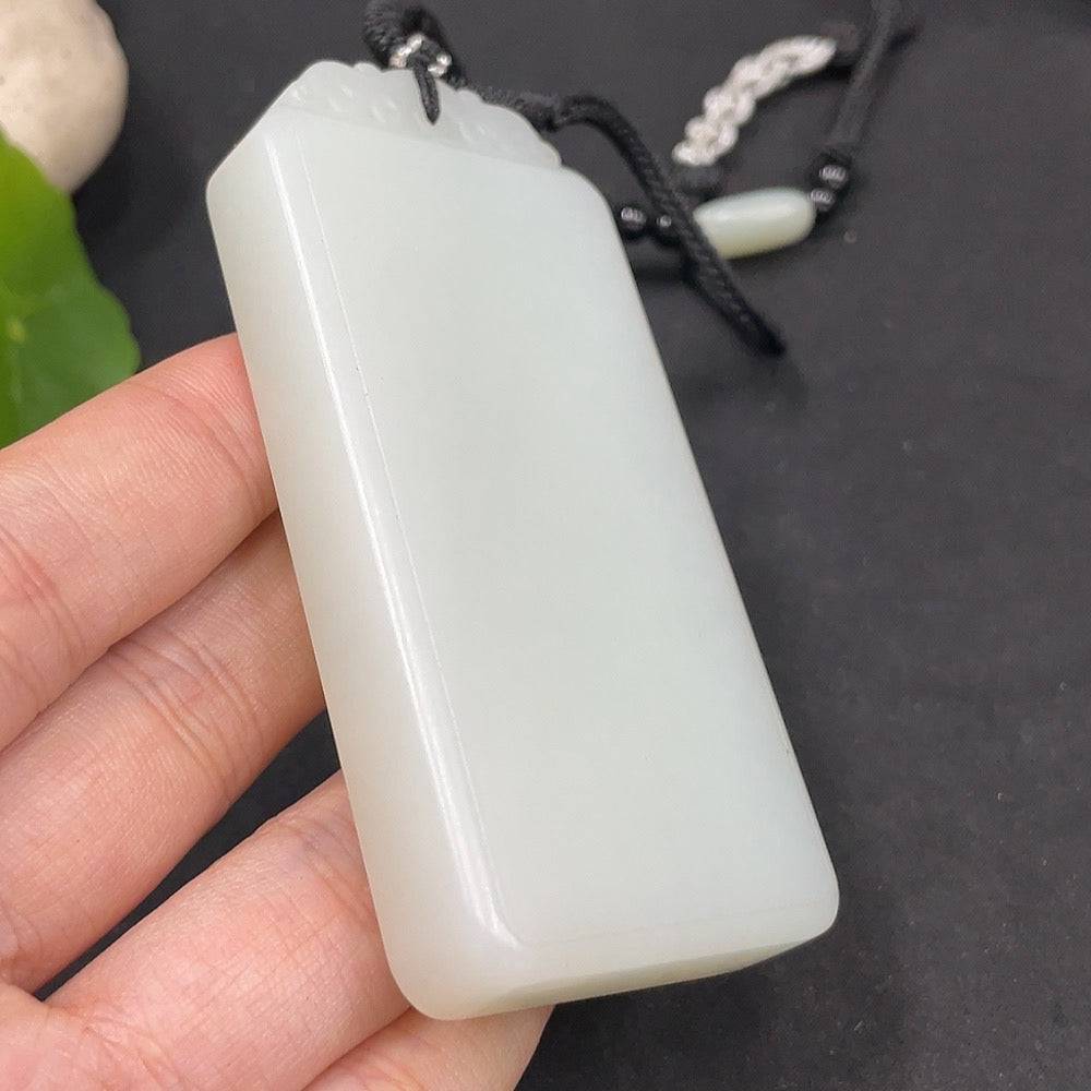 Huiliu certified Hetian jade pendant, plain, smooth jade stone jewelry, showcasing natural green hues and polished surface.
