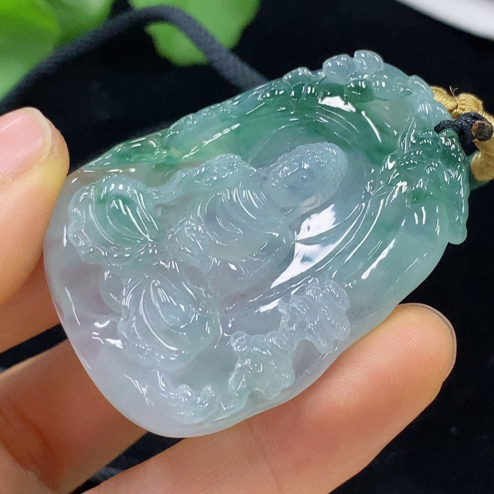 Jadeite Buddha pendant with a carved figure, weighing approximately 26.06g, shown on a natural rope, crafted by HUILIU HQ.