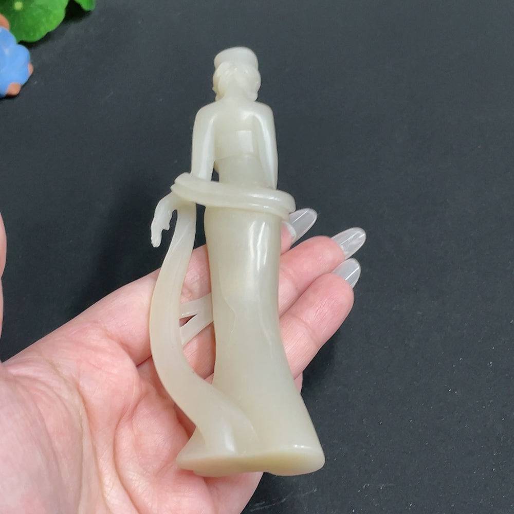 Huiliu certified Hetian jade ornament featuring intricate jade craftsmanship, showcasing smooth, polished jade beauty.