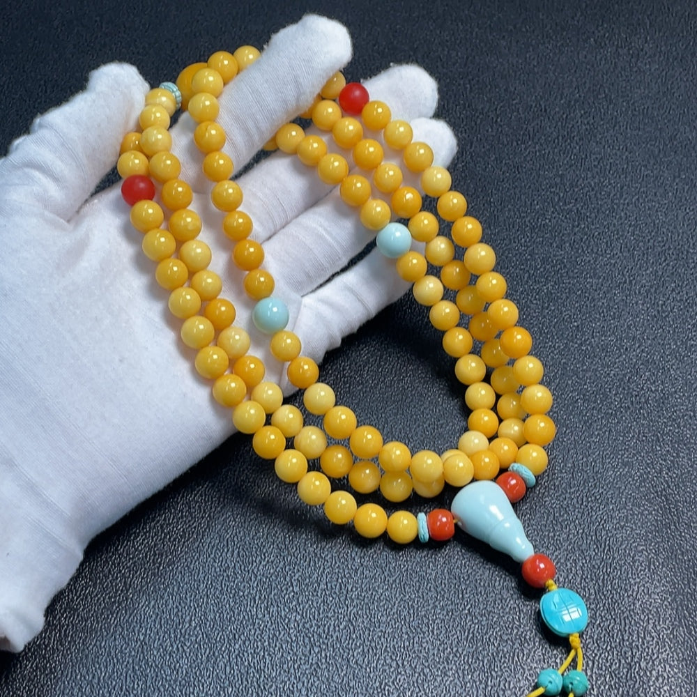 Amber and beeswax bead strand with turquoise accents (non-natural stones considered), ., size range 8.6-16.1mm | Huiliu Certified