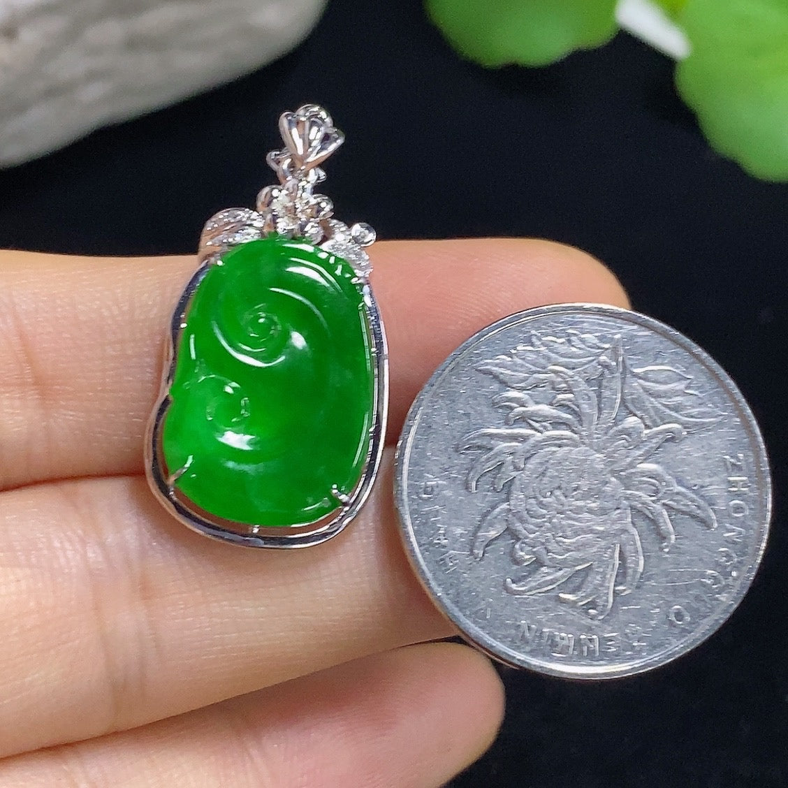 Jadeite Ruyi pendant inlaid with diamonds, 18k gold, showcasing intricate craftsmanship and elegant design.
