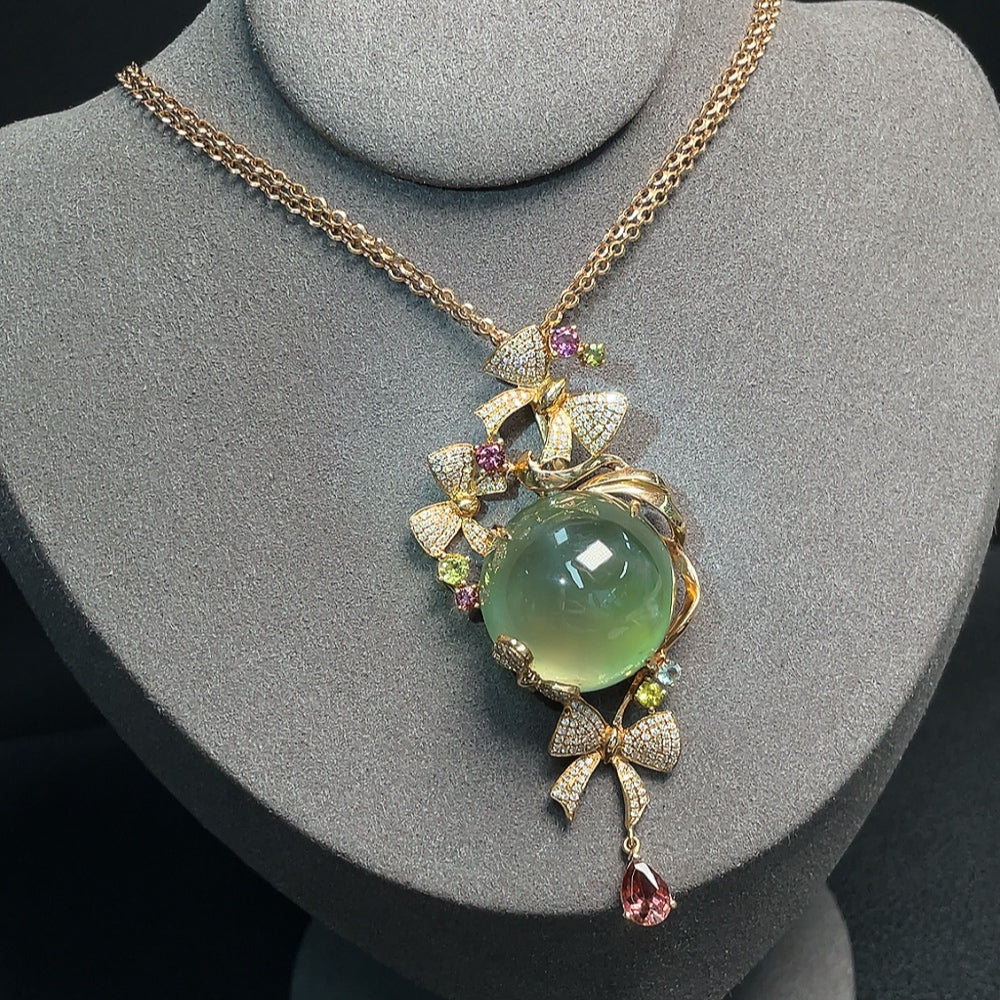 Prehnite pendant with colorless diamond accents and tourmaline, featuring a chain, by HUILIU HQ, gemstone jewelry.