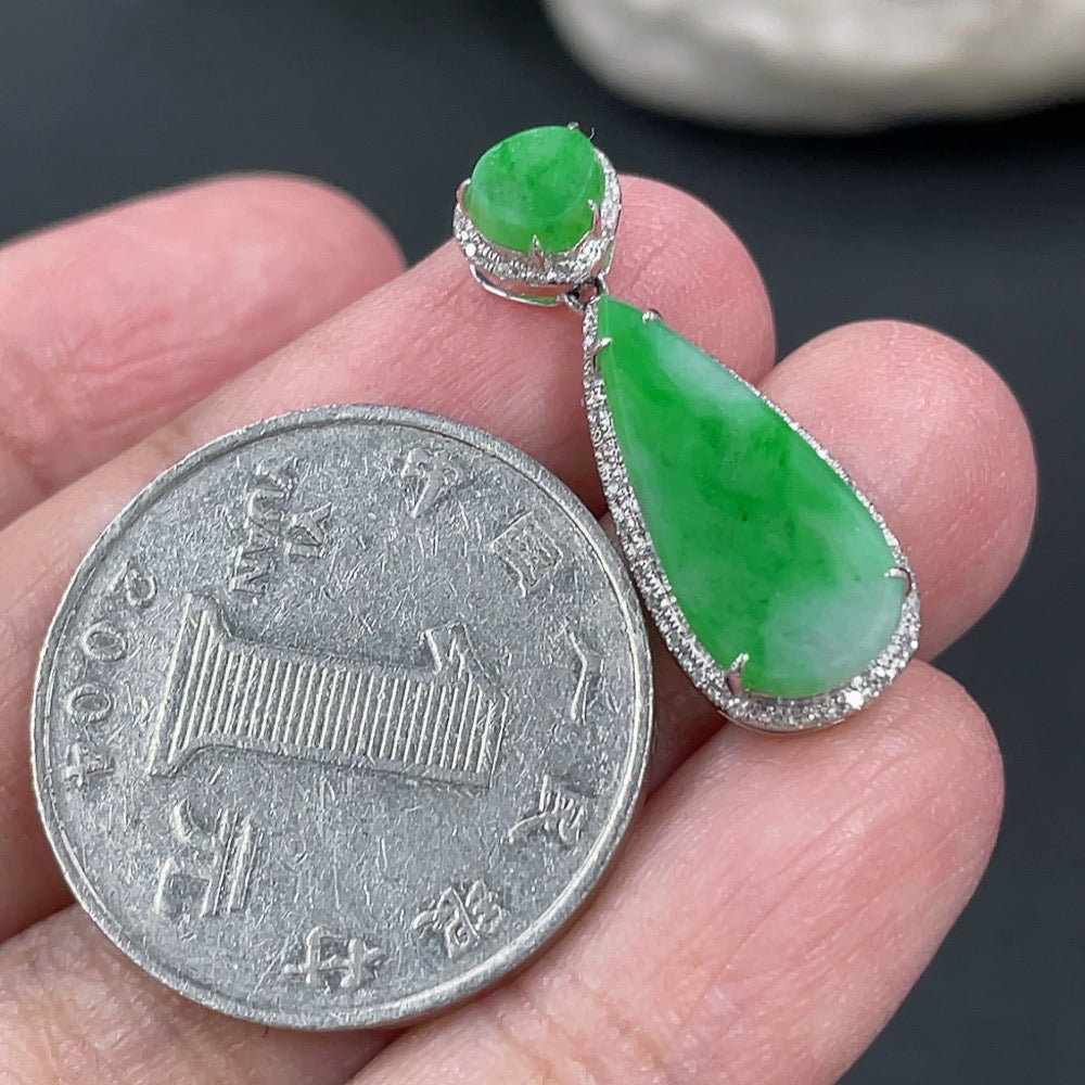 Jadeite pendant with 18k gold and diamond accents, featuring a smooth green jade stone, from HUILIU HQ.