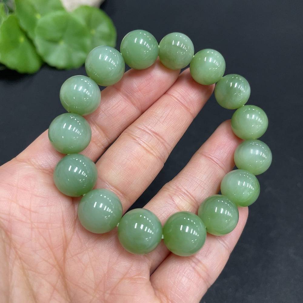 Huiliu certified Hetian jade jasper bracelet with 11.8mm beads, showcasing smooth, polished green and brown stone beads.