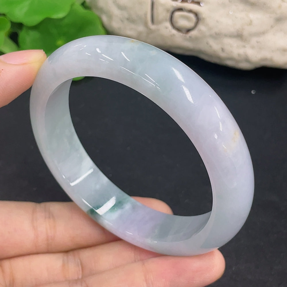 HKHQ jadeite round bangle in size 59.3 with a weight of 69.5g, showcasing smooth, polished jadeite craftsmanship.