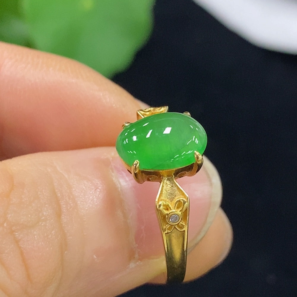Huiliu Jadeite cabochon ring with diamond accents, featuring intricate inlay design and polished jade gemstone.