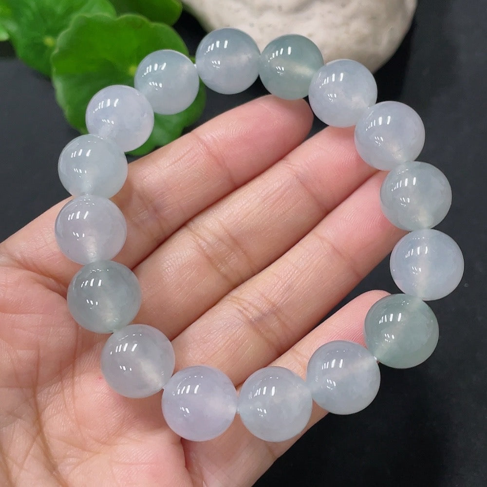HUILIU HQ jadeite bracelet with 12mm beads, approx. 47.72g, showcasing smooth, polished jade stones in natural green hues.