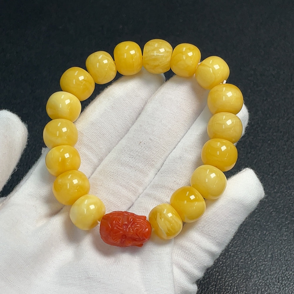 Huiliu Amber Beeswax Bracelet with Southern Red Agate beads, natural amber and red agate stones, handcrafted jewelry.