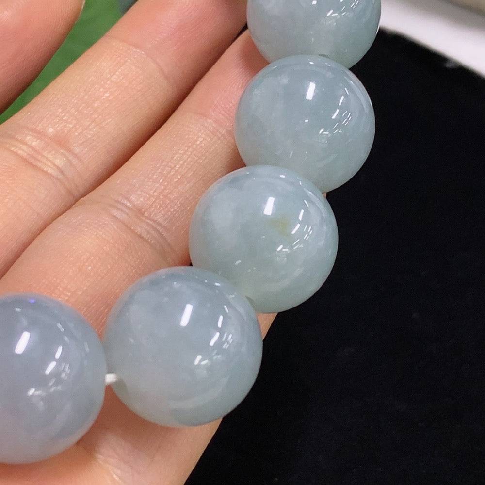 Huiliu Jadeite bracelet with 18.2mm beads, authentic jade, certified by Huiliu HQ, featuring smooth, polished green jade stones.