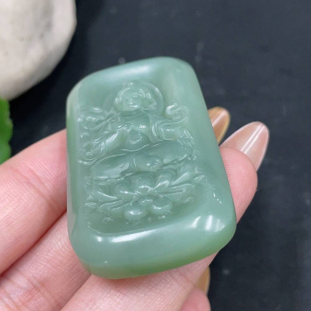 Green Hetian jade pendant featuring a Green Tara design from HUILIU HQ, showcasing smooth, polished jade craftsmanship.