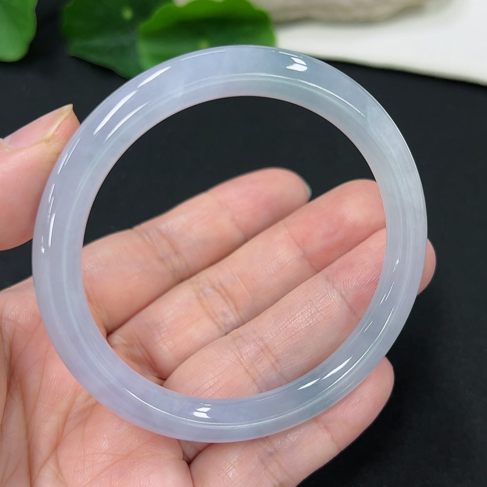 HKHQ jadeite round bangle, size 54.7, weight 27.7g, showcasing smooth, polished jade with a glossy finish.