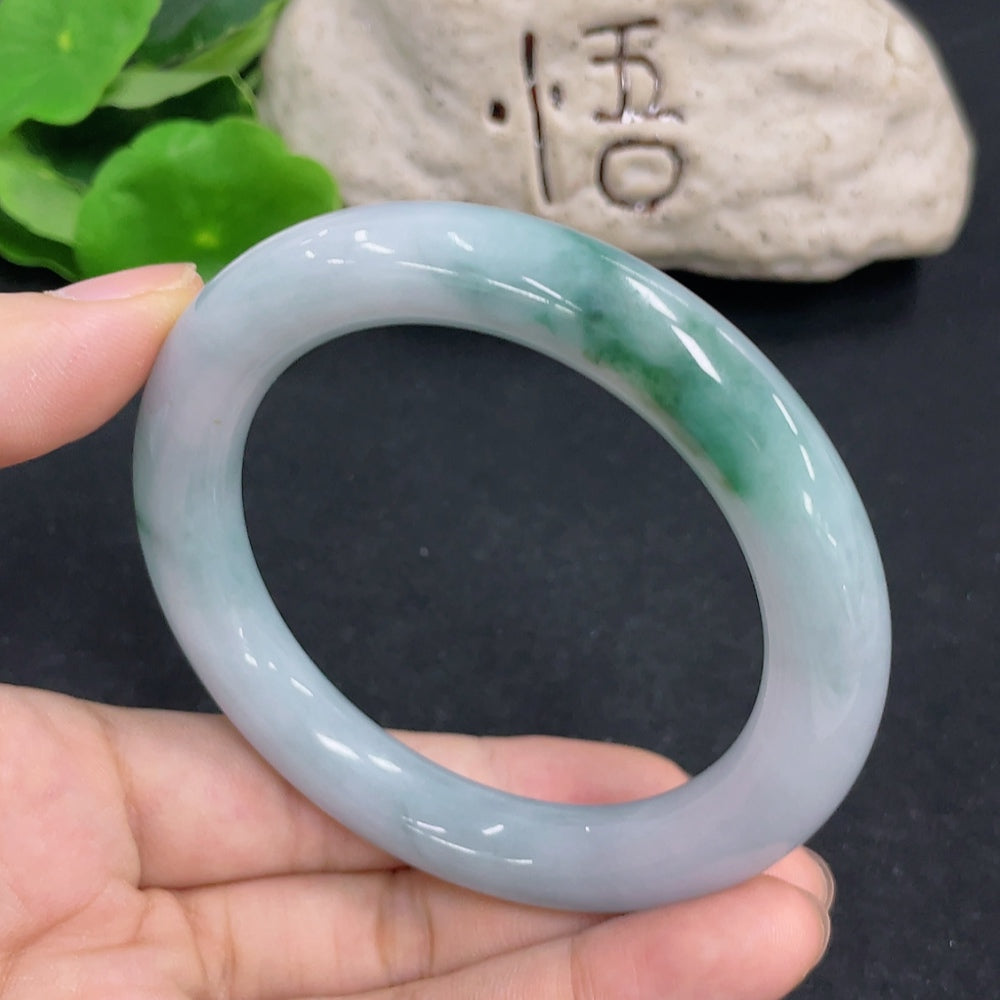 Jadeite round bangle with a smooth finish, weighs approx. 65.9g, size 57.4, crafted by HKHQ, showcasing vibrant green jade jadeite.