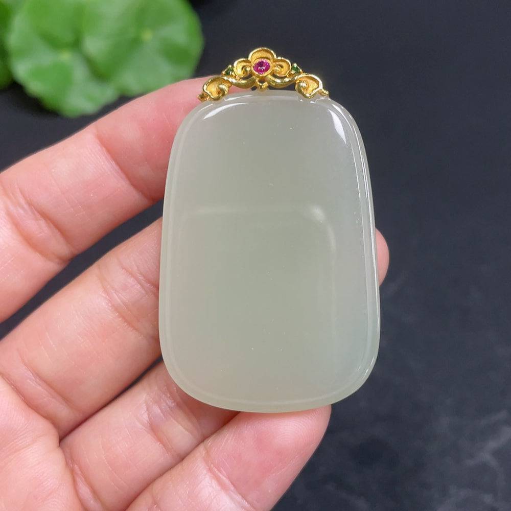 Huiliu Certified Hetian Jade pendant with plain design and clasp, showcasing smooth, polished jade stone in natural color.