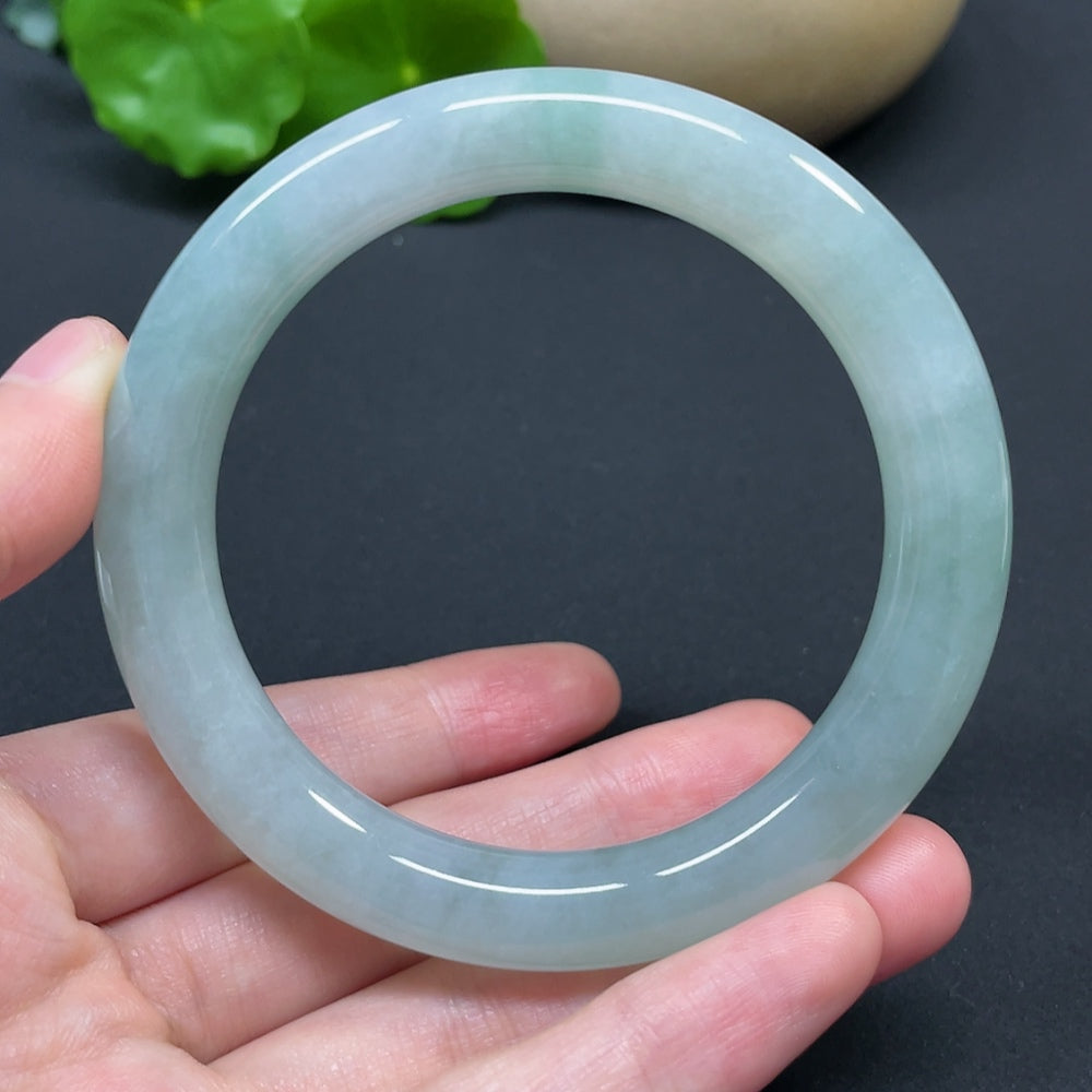 HKHQ jadeite round bangle in size 56.8 with a weight of 53.94g, showcasing smooth, polished jadeite craftsmanship.