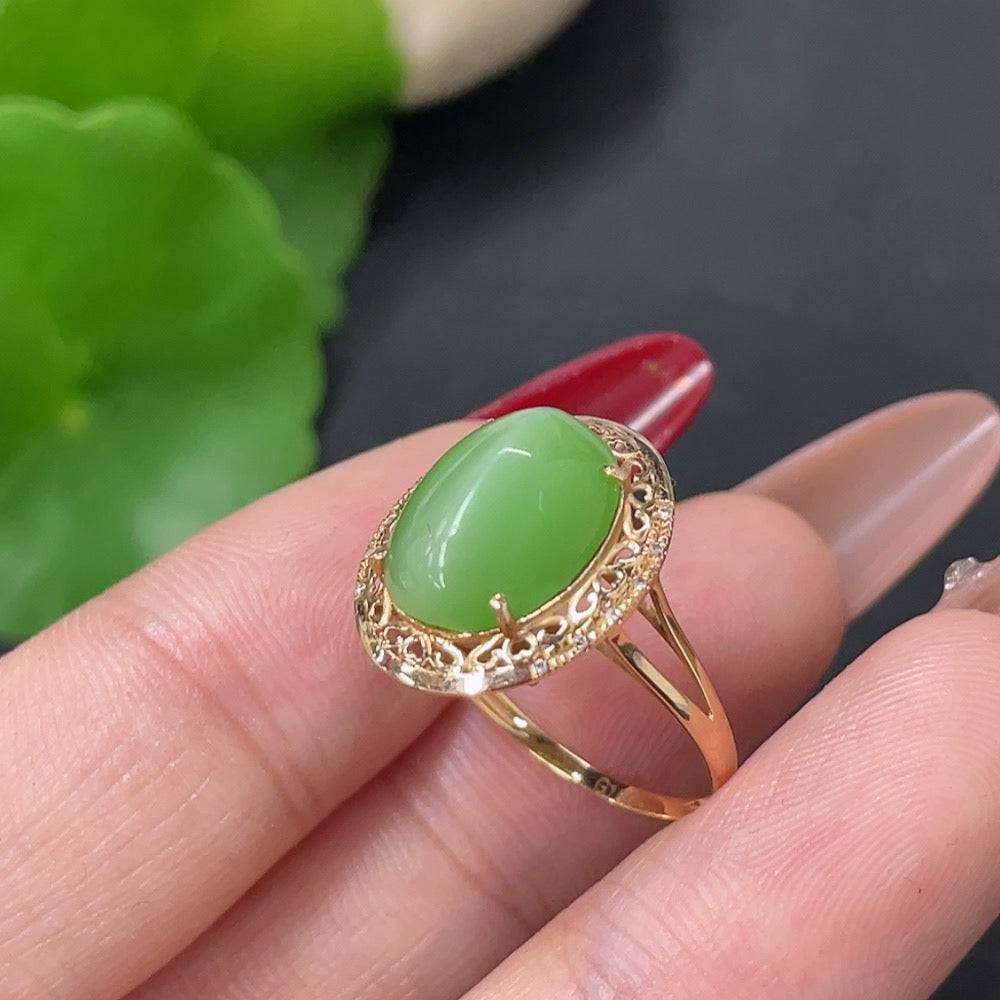 Hetian jade inlaid ring with 18k gold band, size 13, from HUILIU HQ, showing the detailed jade and gold design.