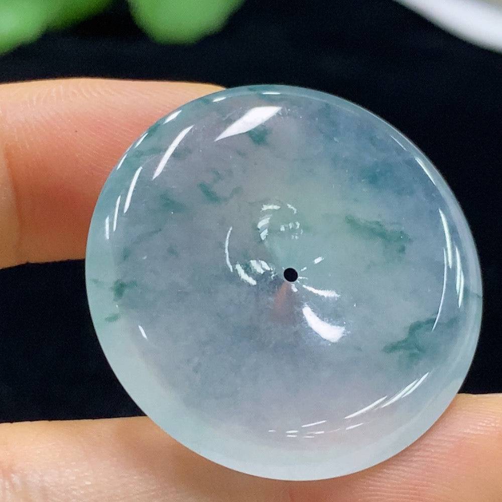 Jadeite Peace Knot pendant from HUILIU HQ, carved jade jewelry with intricate design, weighs approximately 12.82 grams.
