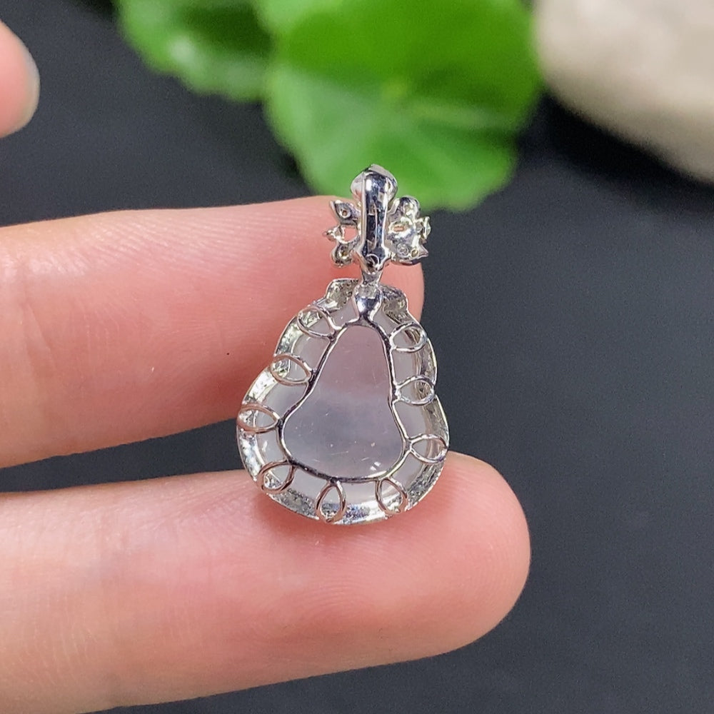 Jadeite pendant in gourd shape with 18k gold setting and diamond accents, weighing approximately 1.9g, by HKHQ.