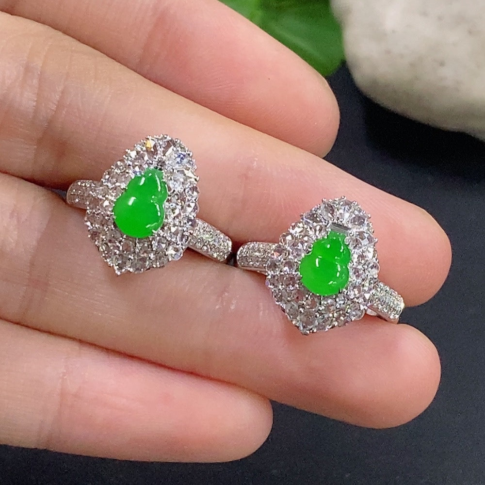 Jadeite gourd inlaid ring with 18k gold and diamond accents, HKHQ size 14, weighing approximately 8.2 grams.