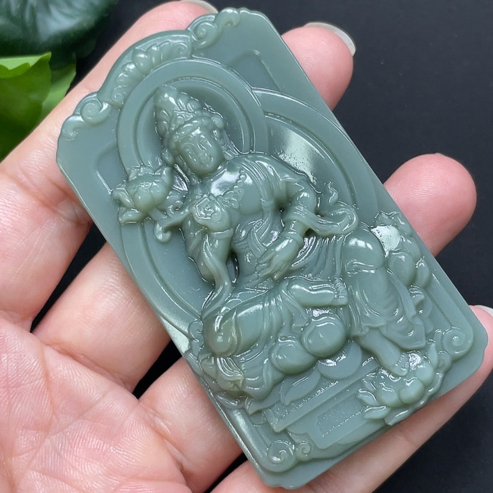 Hetian Jade Jasper Guanyin pendant from HKHQ, intricately carved, weighing approximately 79.6g, showcasing detailed jade craftsmanship.