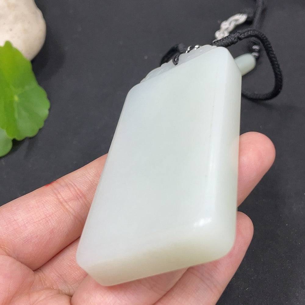 Huiliu certified Hetian jade pendant, plain and smooth jade teardrop design, showcasing natural green and white jade hues.