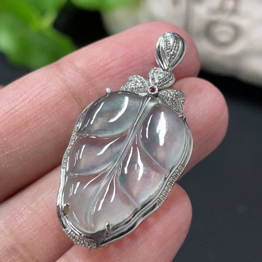 Jadeite leaf inlay pendant with 18K gold and diamond accents, crafted by HUILIU HQ, weighing approximately 3.8g.