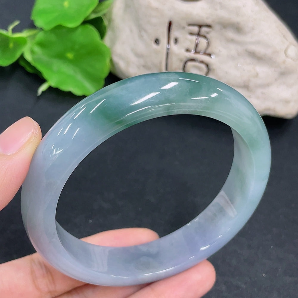 HKHQ jadeite round bangle in size 65, weighing 83.3g, featuring smooth, polished jadeite surface and classic circular design.