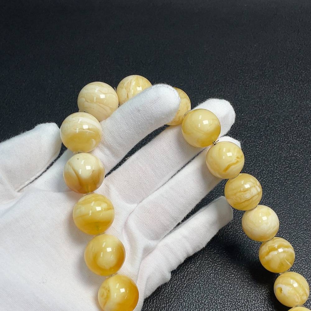 Huiliu Amber and Beeswax Beaded Necklace with 29.9mm beads, natural amber and beeswax, crafted by HUILIU HQ.