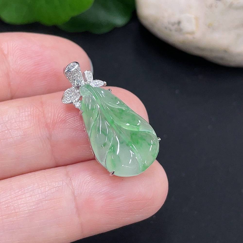 Large green jade gemstone from HUILIU HQ, showcasing smooth, polished surface with natural stone patterns and vibrant color.