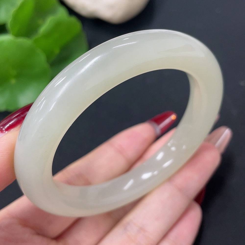Hetian jade round bracelet by HUILIU HQ, size 55, weighing approximately 52.3g, featuring smooth, polished jade beads.