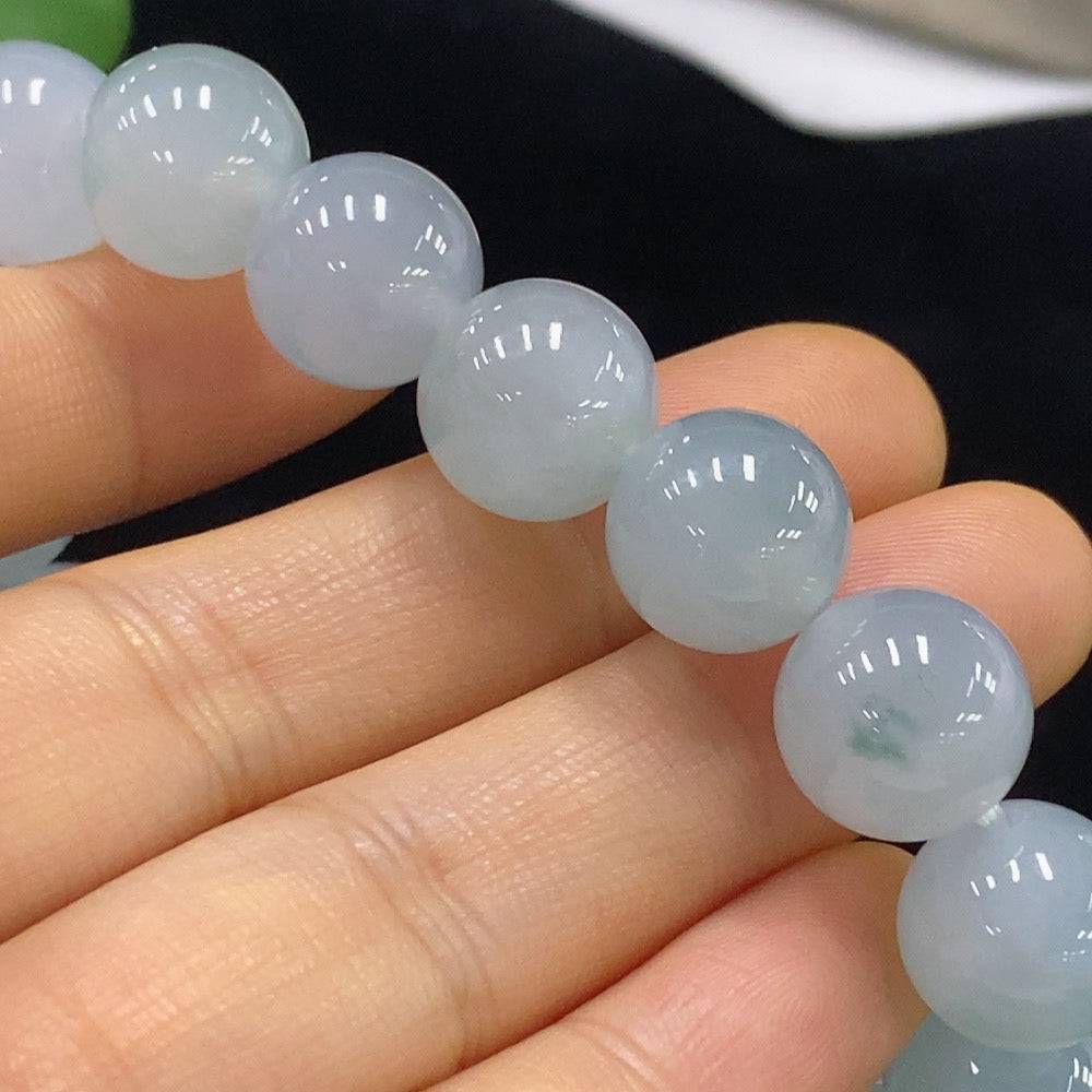 Jadeite bracelet with 12.1mm beads, approximately 51.08g, crafted by HUILIU HQ, featuring smooth green jade stones.