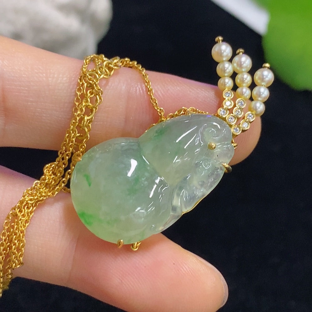 Jadeite gourd pendant set in 18k gold with diamond accents, total weight approximately 8.15g (including chain)
