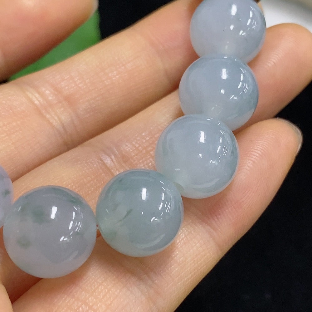 Huiliu certified jadeite beads, 12.5mm size, featuring smooth, polished green jade stones with natural variations.