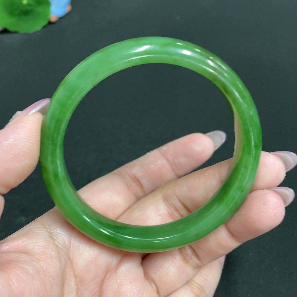 HKHQ Hetian Jade round bracelet, size 59.2, weighing approximately 44.1g, featuring smooth, polished jade beads.