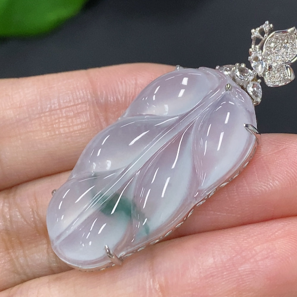 Jadeite leaf pendant necklace by HKHQ featuring 18K gold and diamond accents, close-up of detailed jewelry design.