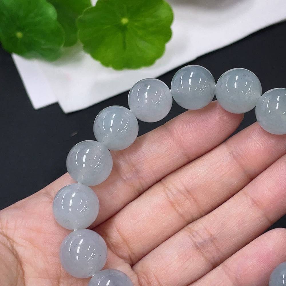 Huiliu Certified Jadeite bracelet, 12.8mm jade beads, natural green hue, elegant jewelry accessory.