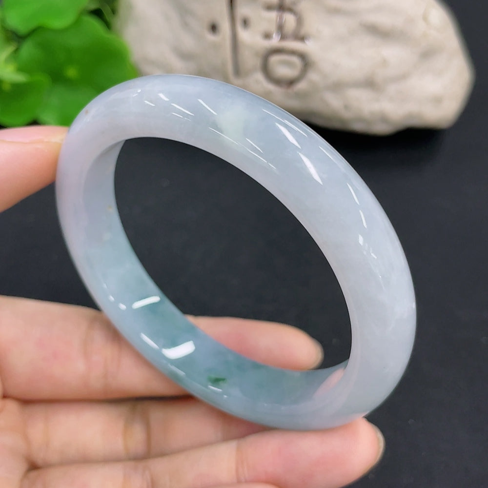 Jadeite round bangle in vibrant green jade, HKHQ brand, weighing approx. 49.3g, size 54.4, smooth and polished surface.