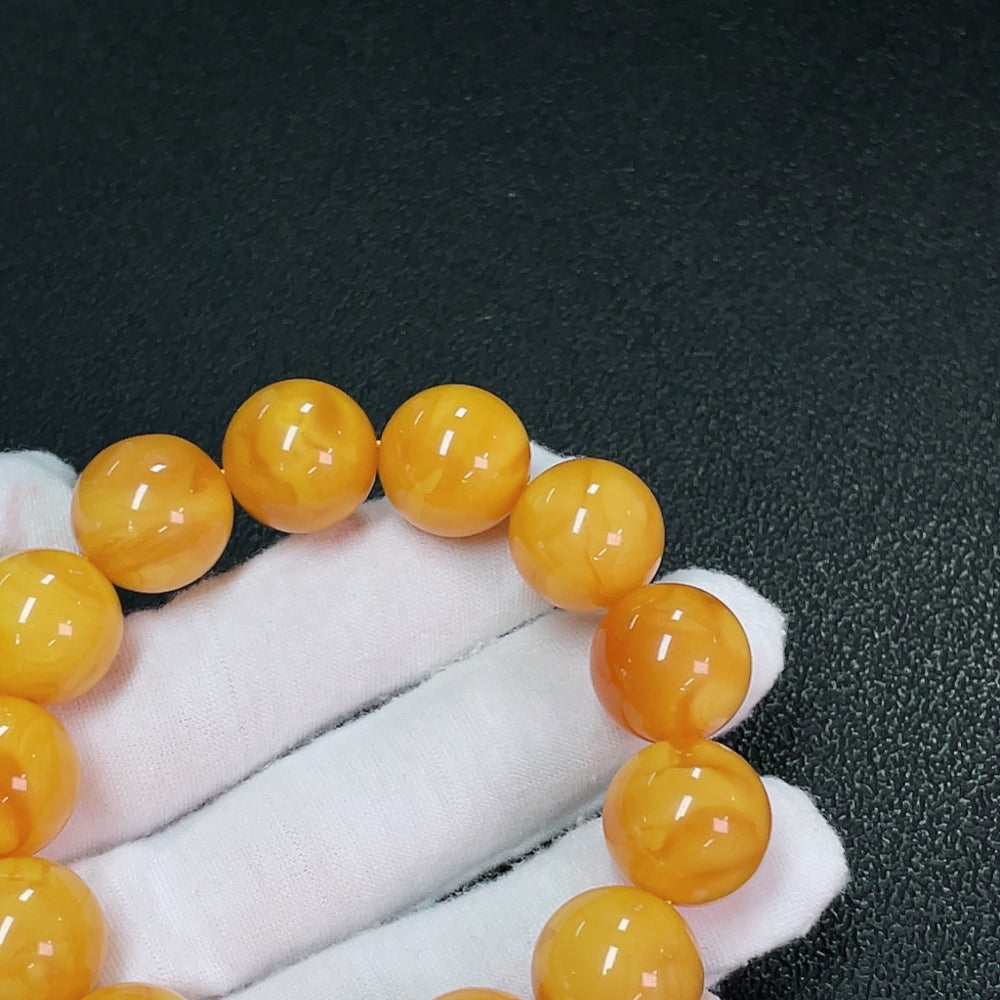 Amber beeswax bracelet, total weight about 31.24g, size about 16mm, color origin undetermined