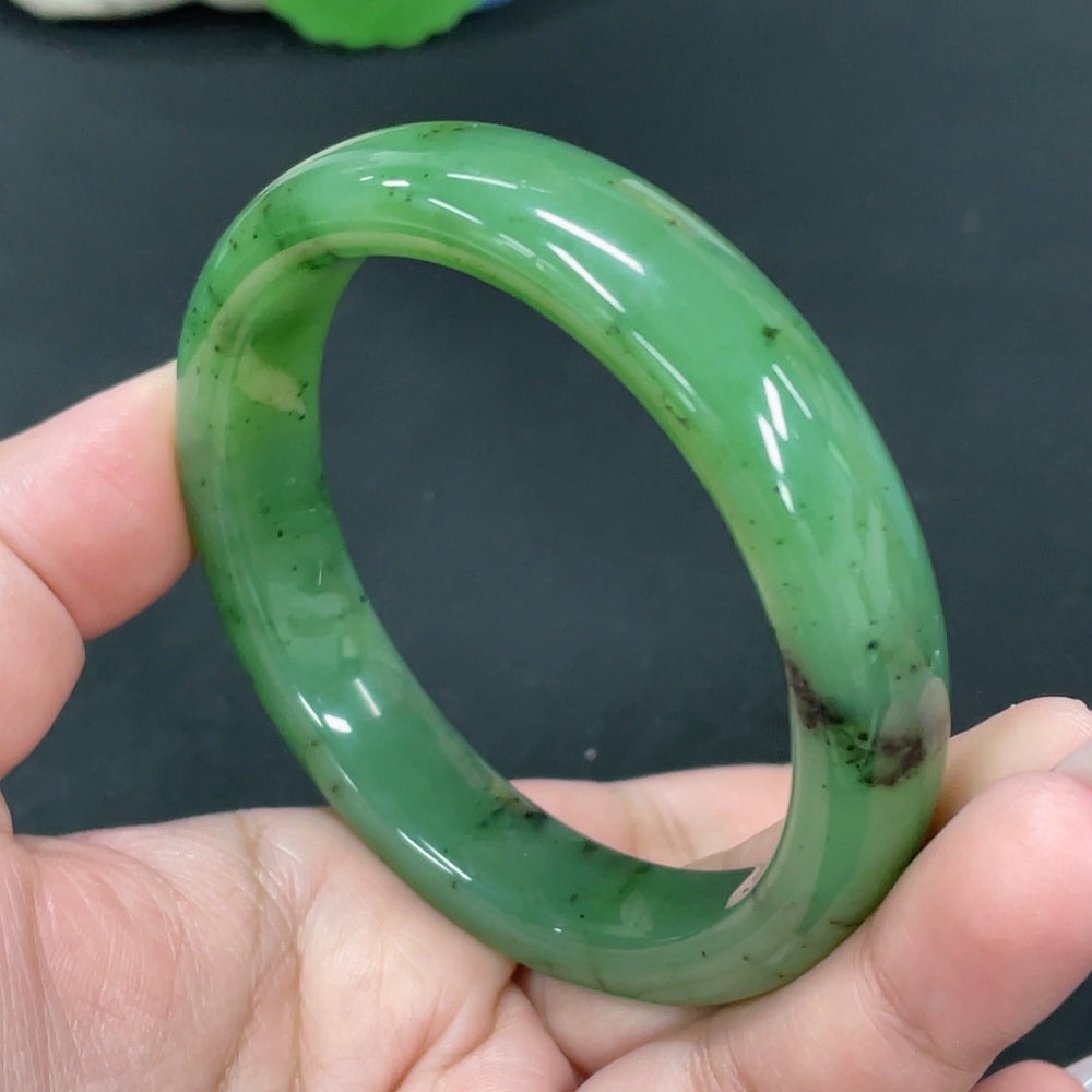 Huiliu certified Hetian Jade round bracelet featuring smooth, polished jade beads on a delicate string for elegant wear