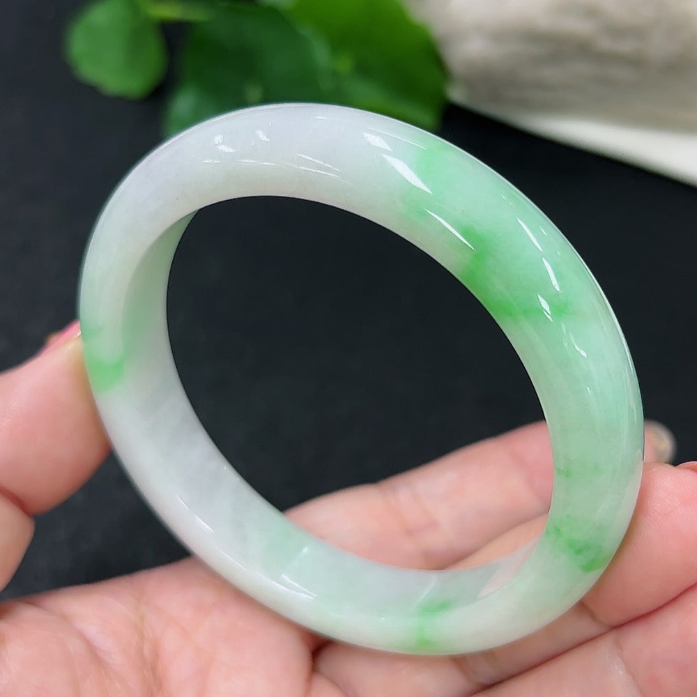 HKHQ Jadeite round bangle in size 56, weighing 51.3g, showcasing smooth, polished jadeite with a glossy finish.