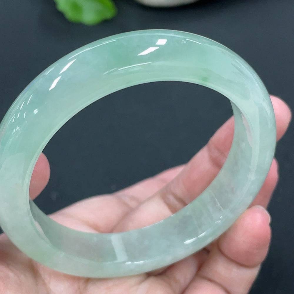 HUILIU HQ Jadeite round bracelet, 56.5mm, crafted from green jade, weighing approximately 61.61g, close-up of smooth polished beads