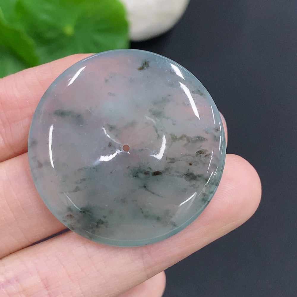 Jadeite Peace Knot jewelry piece weighing approximately 10.7g with intricate design, crafted by HKHQ.
