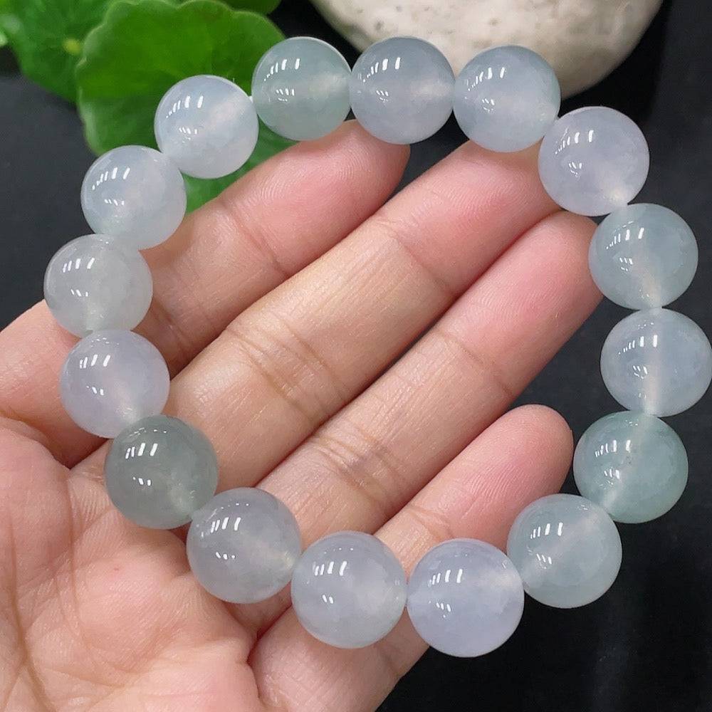 HUILIU HQ jadeite bracelet with 12mm beads, totaling approximately 47.72 grams, showcasing smooth, polished green jade stones.
